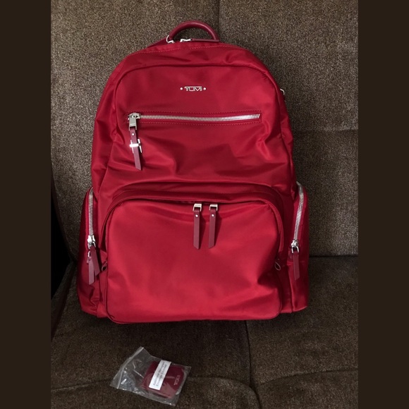 tumi red luggage